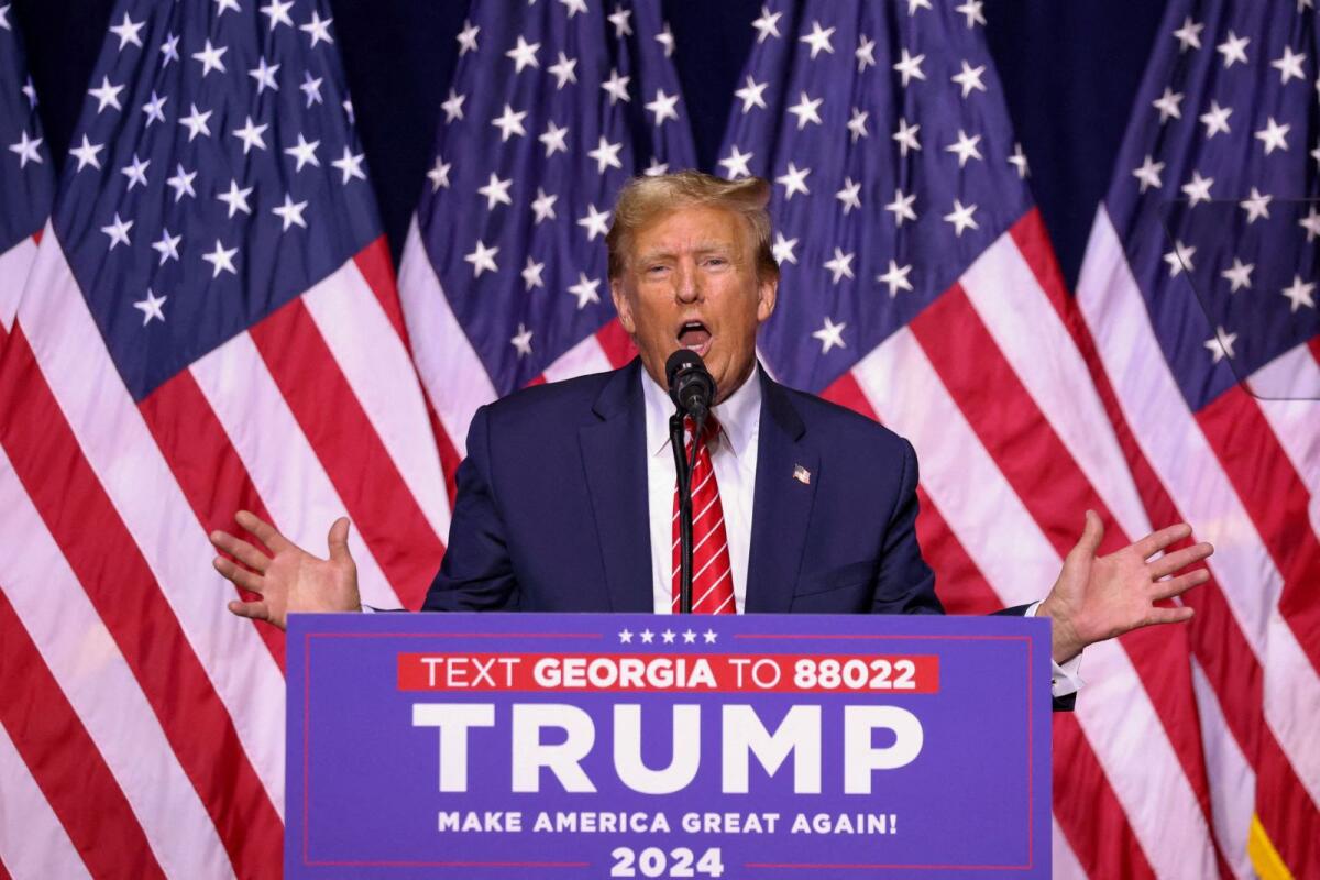 المرشح الرئاسي الجمهوري والرئيس الأمريكي السابق دونالد ترامب يتحدث خلال تجمع انتخابي في مركز فورم ريفر في روما، جورجيا، في 9 مارس. — رويترز