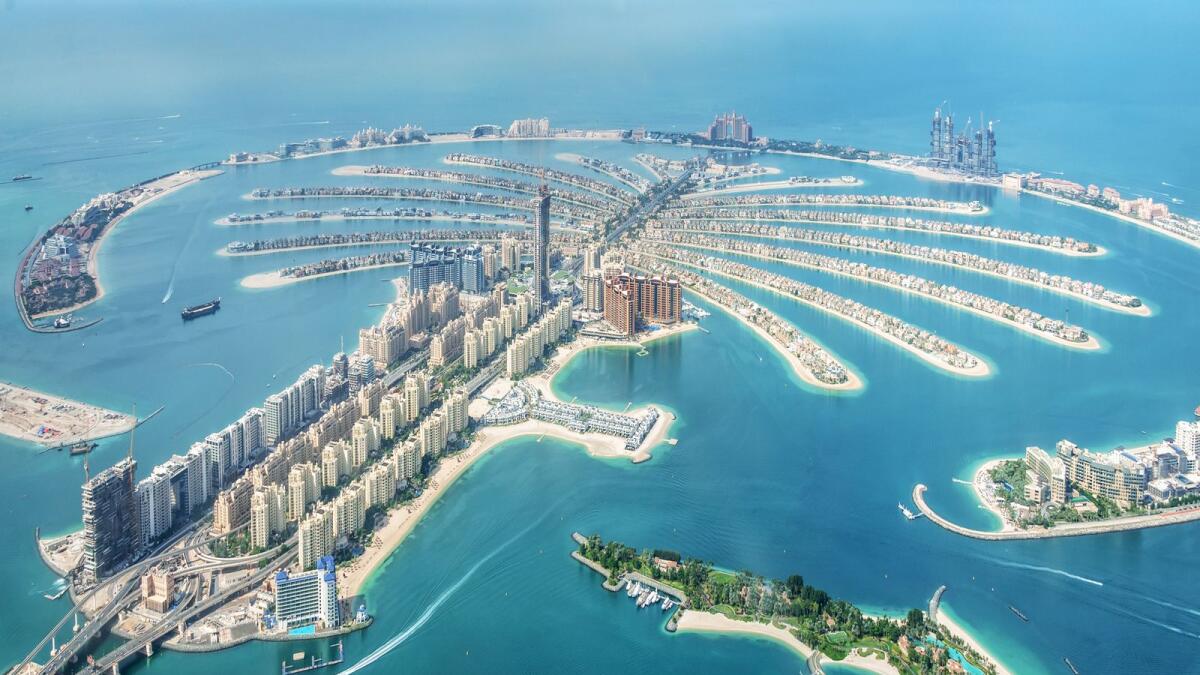 منظر جوي لجزيرة نخلة جميرا في دبي.  أظهر سوق العقارات في دبي مرونة وقدرة على التكيف على الرغم من الظروف الاقتصادية العالمية الصعبة.